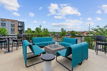Two outdoor patios with kitchens and firepits